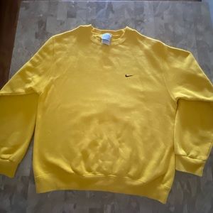 Yellow Nike Mini swoosh crew neck.